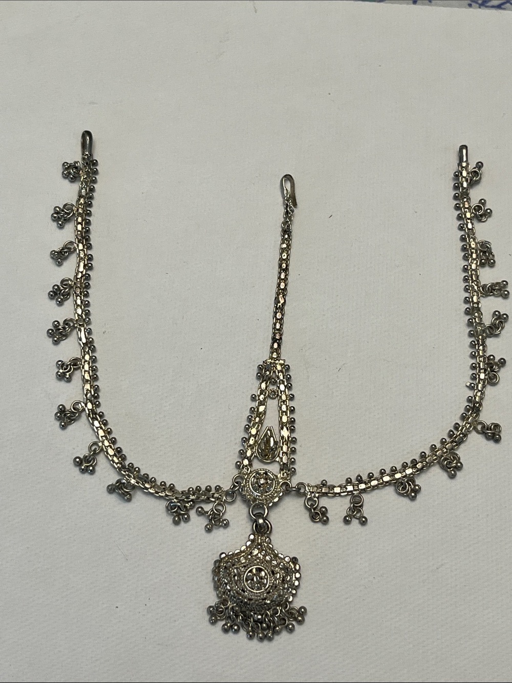 Intricate Silver Tikka Headpiece with Floral Detailing